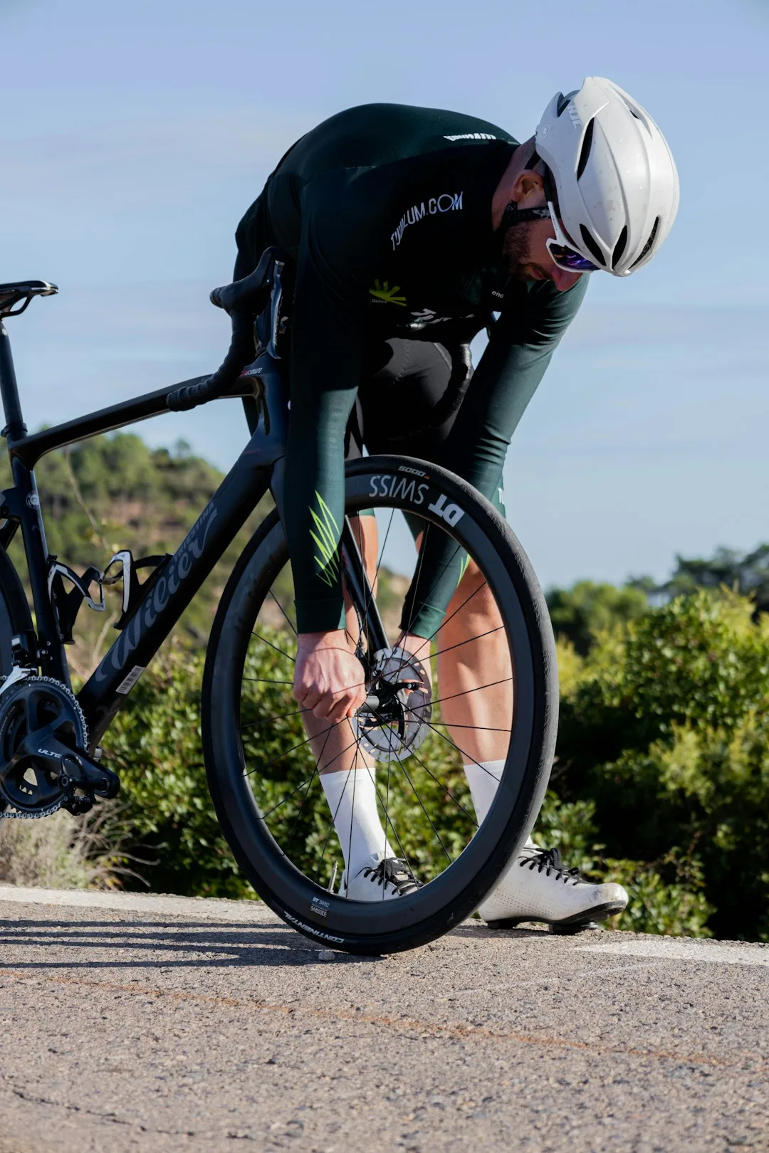 Cyclist training on a country road.